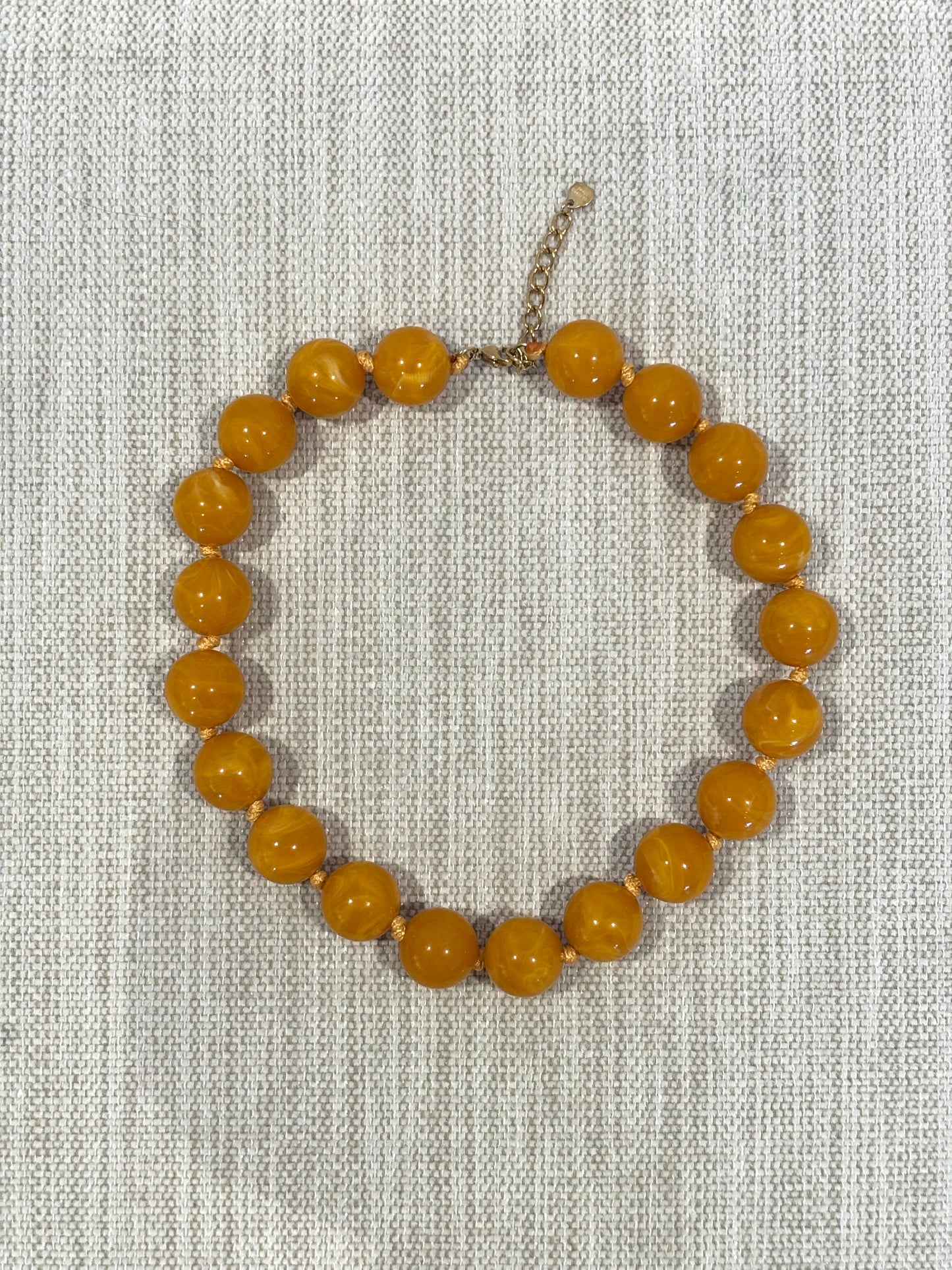 COLLAR BALL MOSTAZA